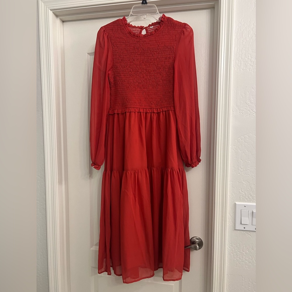 Rust color dress with sheer sleeves